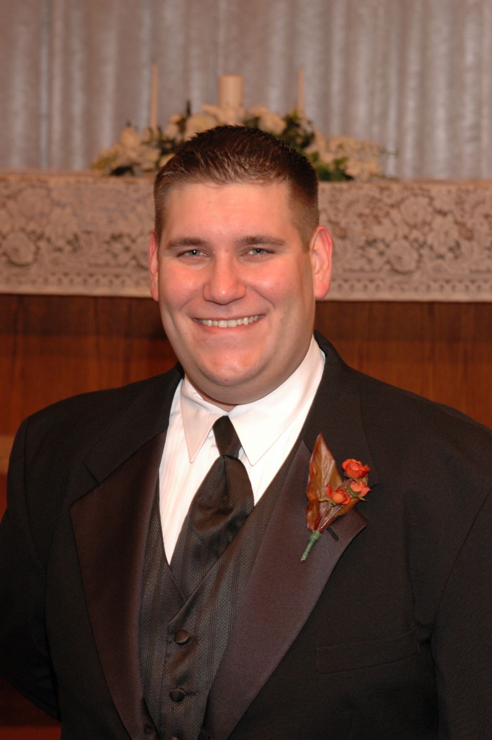 man in tuxedo with boutonniere