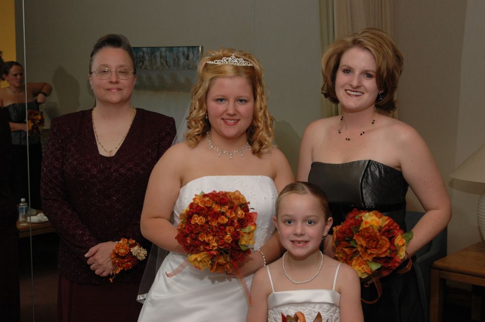 Wedding party posing for a photo indoors