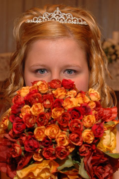 1985 Ford Crown Victoria LTD - A woman with a tiara and a bouquet of flowers obscures her face.