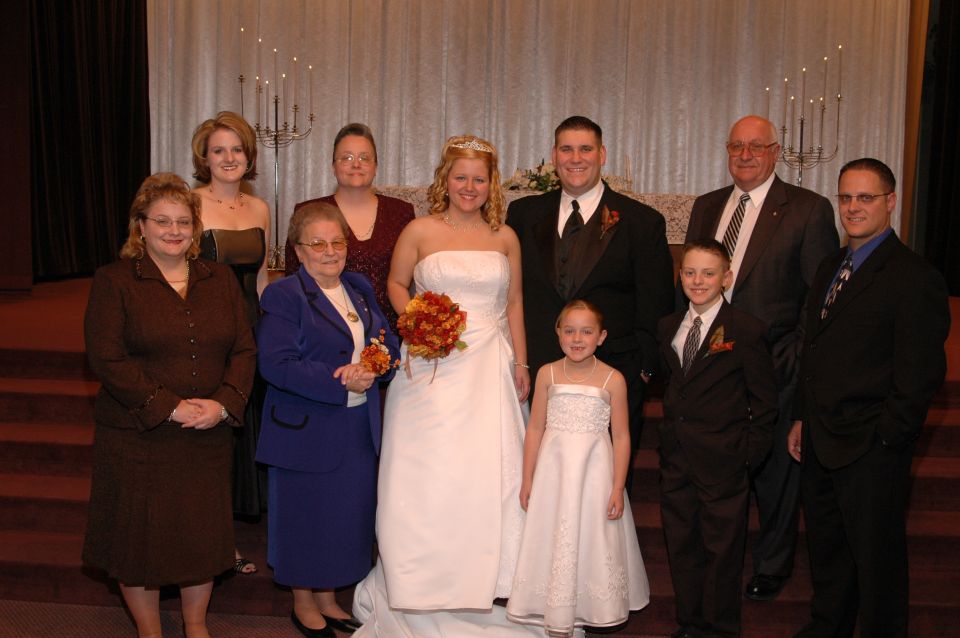 Wedding party posing for a photo indoors