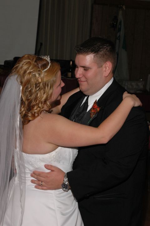 1985 Ford Crown Victoria LTD - A newlywed couple shares a dance, celebrating their special day.