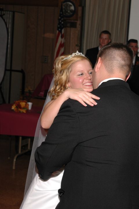 1985 Ford Crown Victoria LTD - A bride and groom share a dance at their wedding reception.