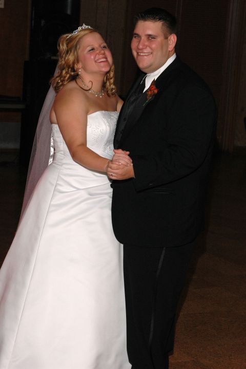 1985 Ford Crown Victoria LTD - A newly married couple shares a joyful moment on the dance floor.