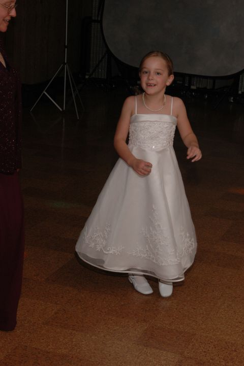 Girl in a white dress with a pearl necklace