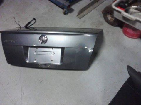 2002 Volkswagen Jetta - This is the trunk lid from a 2002 Volkswagen Jetta, showing the rear emblem and license plate mount.