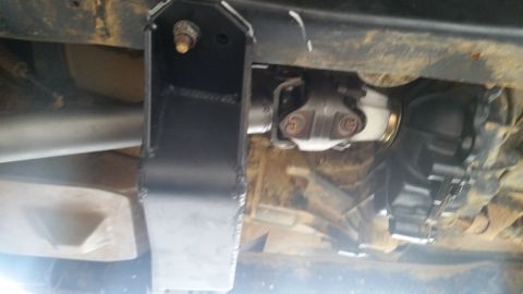 1988 Ford Bronco - Underside view shows driveshaft and transfer case, possibly with aftermarket modifications.