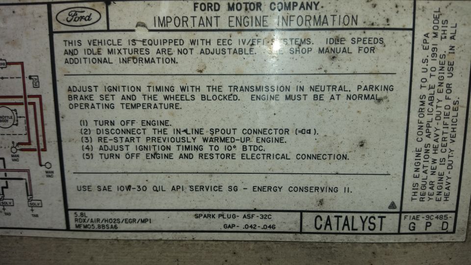 Ford 5.8L important engine information label with EEC IV timing procedure and spark plug spec