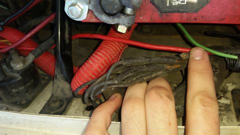 1991 Ford F-250 - Engine bay wiring detail, showing various cables and a Motorcraft part.