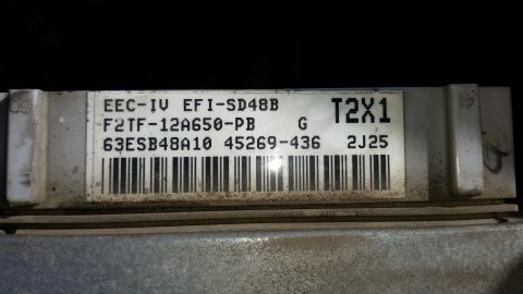 1991 Ford F-250 - Close-up of a Ford EEC-IV EFI-SD48B engine control module, part number F2TF-12A650-PB.