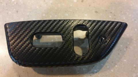 1995 Ford Bronco - This carbon fiber trim piece has a distinctive weave pattern and appears to be a replacement part.