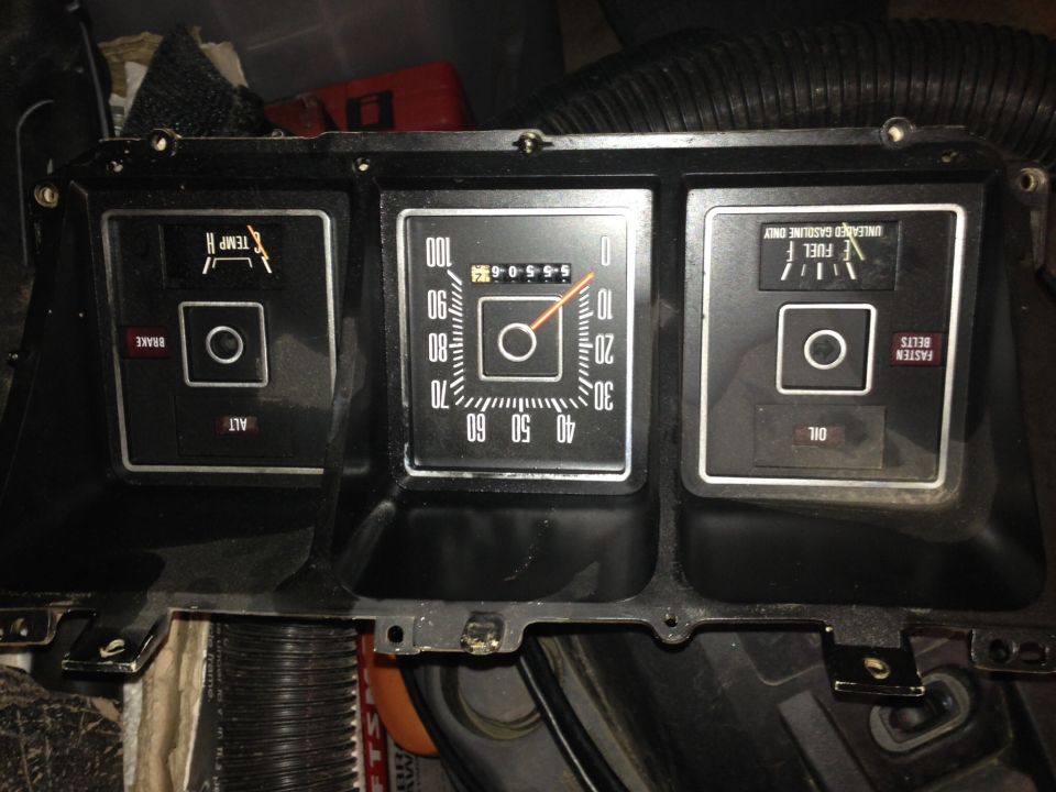 1979 Ford Bronco instrument cluster with odometer showing 90555