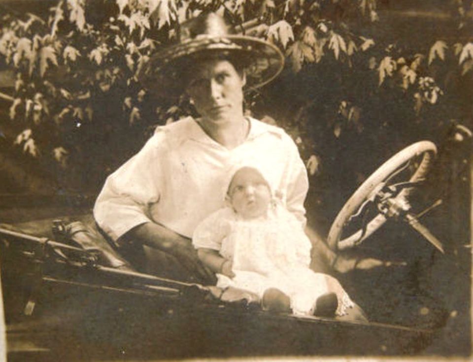 1915 Ford Model T with woman and baby
