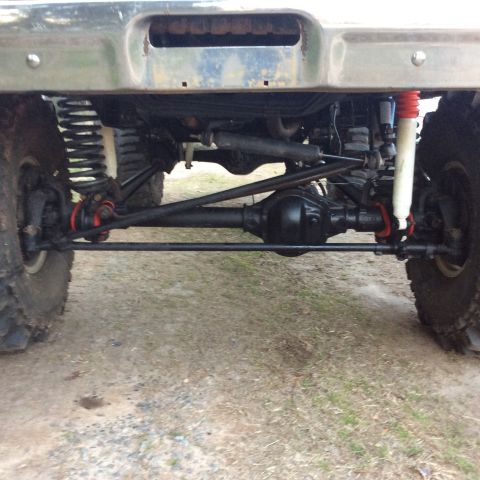 1979 Ford Bronco - Close-up of the rear suspension and drivetrain components on a 1979 Ford Bronco.