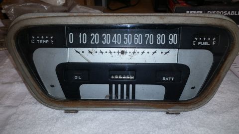 2015 Chevrolet new - This vintage dashboard gauge cluster displays a speedometer, fuel gauge, oil pressure indicator, and battery charge indicator.