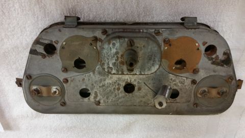 2015 Chevrolet new - This is a rear view of a vintage dashboard instrument cluster, showing its internal mounting and connections.