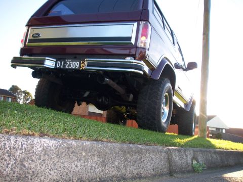 1985 Ford Bronco - Rear view of a 1985 Ford Bronco showing its tailgate and bumper.