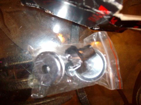 2004 Ford Crown Victoria - Bagged suspension components are shown, with partial cardboard packaging above.