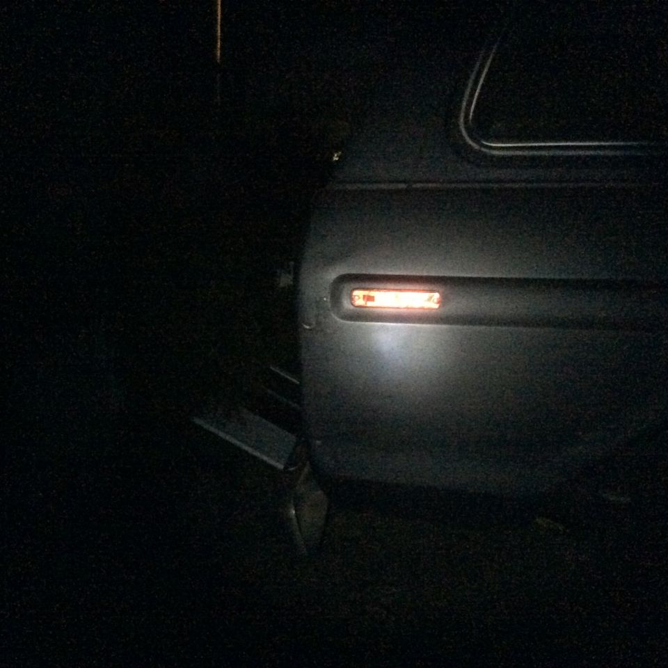 close-up of a vehicle's illuminated side marker light