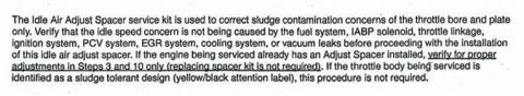 1990 Ford Bronco - Close-up text excerpt of the Ford Idle Air Adjust Spacer service kit instructions describing its use to correct throttle-bore/plate sludge…