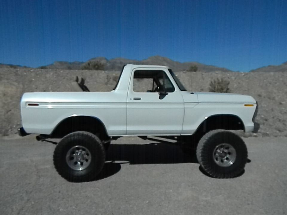 White 1979 Ford Bronco side view