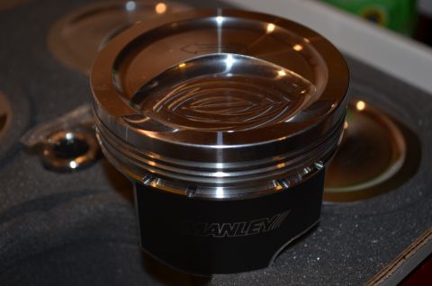 2007 Mazda 6 - A close-up view of a Manley piston, a component for a vehicle's engine.