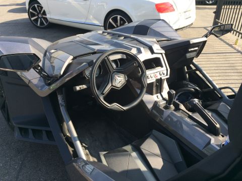 1968 Ford Mustang - Interior view of a Polaris Slingshot, showing the dashboard and seating area.