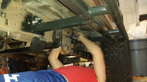 1996 Ford Bronco - My son getting locktite on the bolts