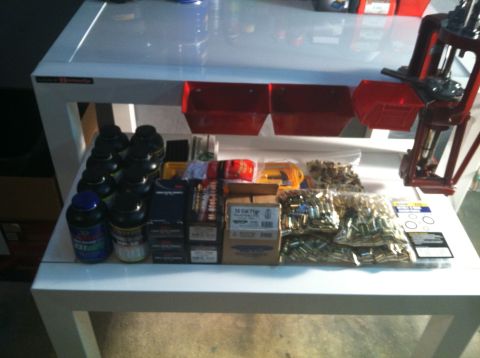 1992 Ford Mustang - Various reloading components are organized on a white table.