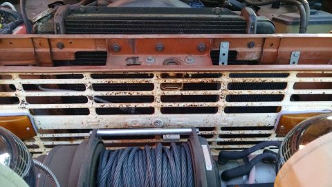 1985 Jeep CJ7 - Front grille and winch assembly on an older vehicle.