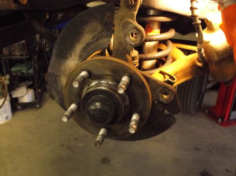 1999 Mercury Grand Marquis - This photo shows the brake rotor and suspension assembly of a vehicle, not a 1999 Mercury Grand Marquis.