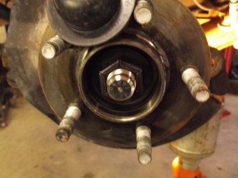 1999 Mercury Grand Marquis - Wheel hub assembly detail, likely during a front-end rebuild or repair.