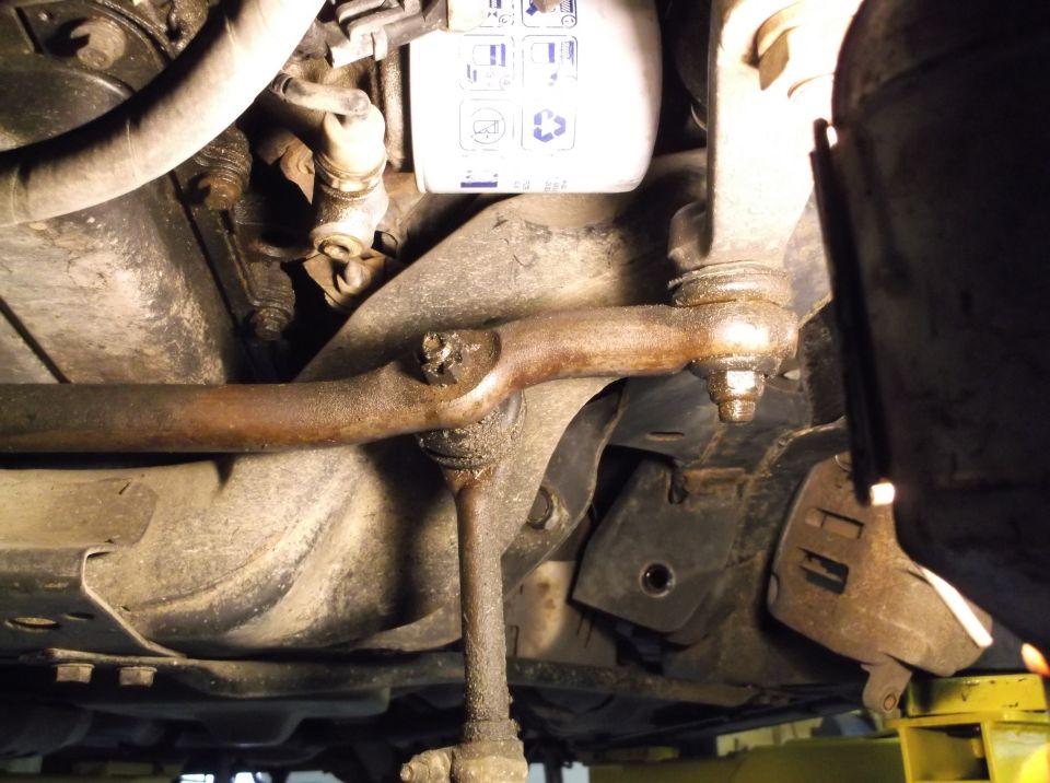 Suspension components with oil filter visible