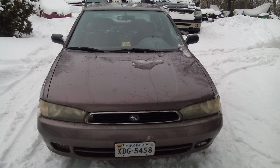 1996 Subaru Legacy front view in snow