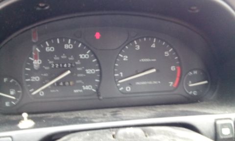 1996 Subaru Legacy - The vehicle's odometer reads 221,425 miles, and the tachometer is at idle.
