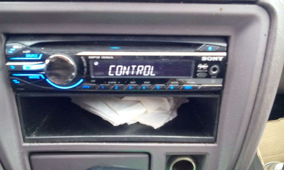Car interior with Sony stereo displaying 'CONTROL'
