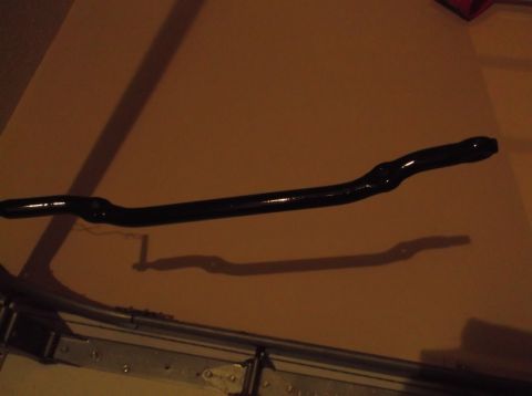1999 Mercury Grand Marquis - A black sway bar is shown, likely for a vehicle's suspension system.