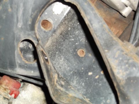 1999 Mercury Grand Marquis - This image shows a close-up of a vehicle's frame, not a complete vehicle, making year and model identification impossible.