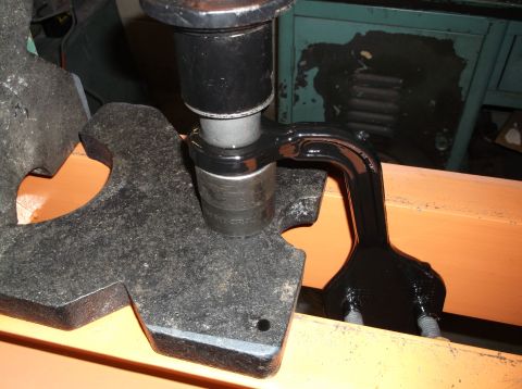 1999 Mercury Grand Marquis - Close-up of a vehicle suspension part being worked on, with a SuperMotors.net watermark visible.