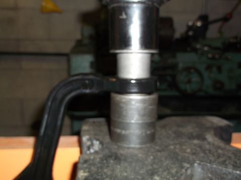 1999 Mercury Grand Marquis - A socket wrench is shown engaging a bolt, with a "SUPERMOTORS" watermark visible at the bottom right.