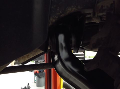 1999 Mercury Grand Marquis - Underside view of a vehicle's suspension system, focusing on a single component.
