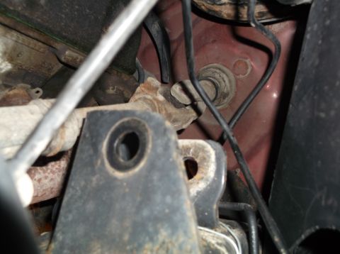 1999 Mercury Grand Marquis - Engine bay components with visible rust and wiring.