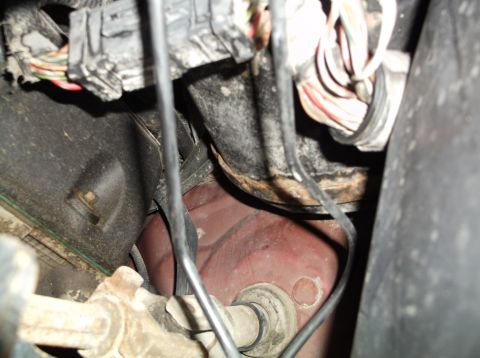 1999 Mercury Grand Marquis - Close-up view of the engine bay wiring harness and various components, suggesting a part or repair context.