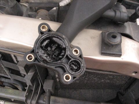 1994 Ford Bronco - Oil sludge in the oil fill. The first sign of problems.