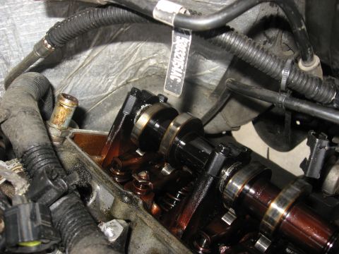 1994 Ford Bronco - Upon closer inspection there is metal around the rear camshaft bearings and the metal is blackened from excessive heat.