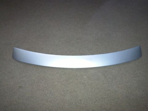 2002 Volkswagen Jetta - This is a silver trim piece, likely for a car's exterior or interior.