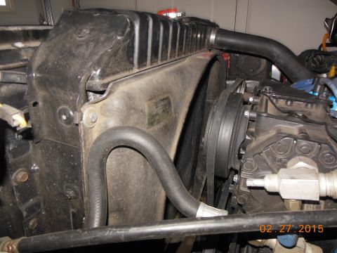 1979 Ford F-150 - Close-up view of a vehicle's radiator and fan shroud.