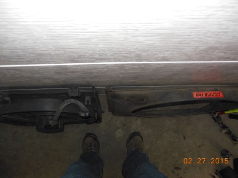 1979 Ford F-150 - A radiator fan and shroud are shown, with a warning label indicating it's a fan.