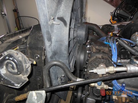 1979 Ford F-150 - Close-up view of the engine bay, highlighting the fan, horn, and various engine parts.