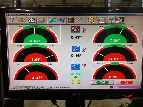 2000 Mercury Grand Marquis - A digital screen displays wheel alignment data for a 2005 Mercury Grand Marquis with air suspension.