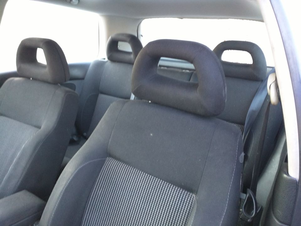 Interior rear seats with headrests and seatbelts